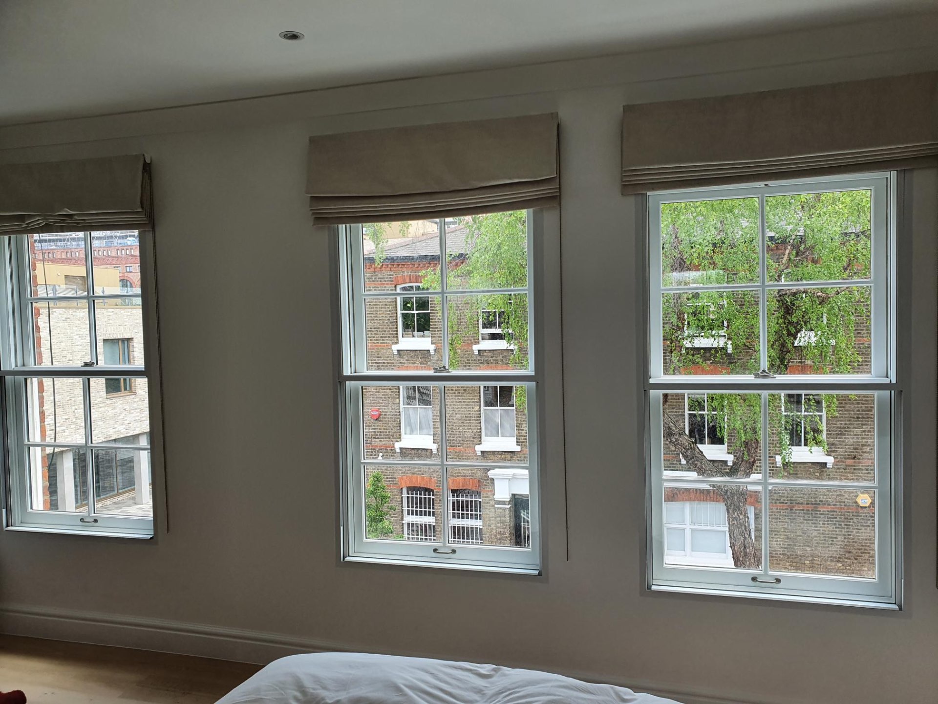 Victorian sash windows with secondary glazing installed, showing elegant period property features preserved