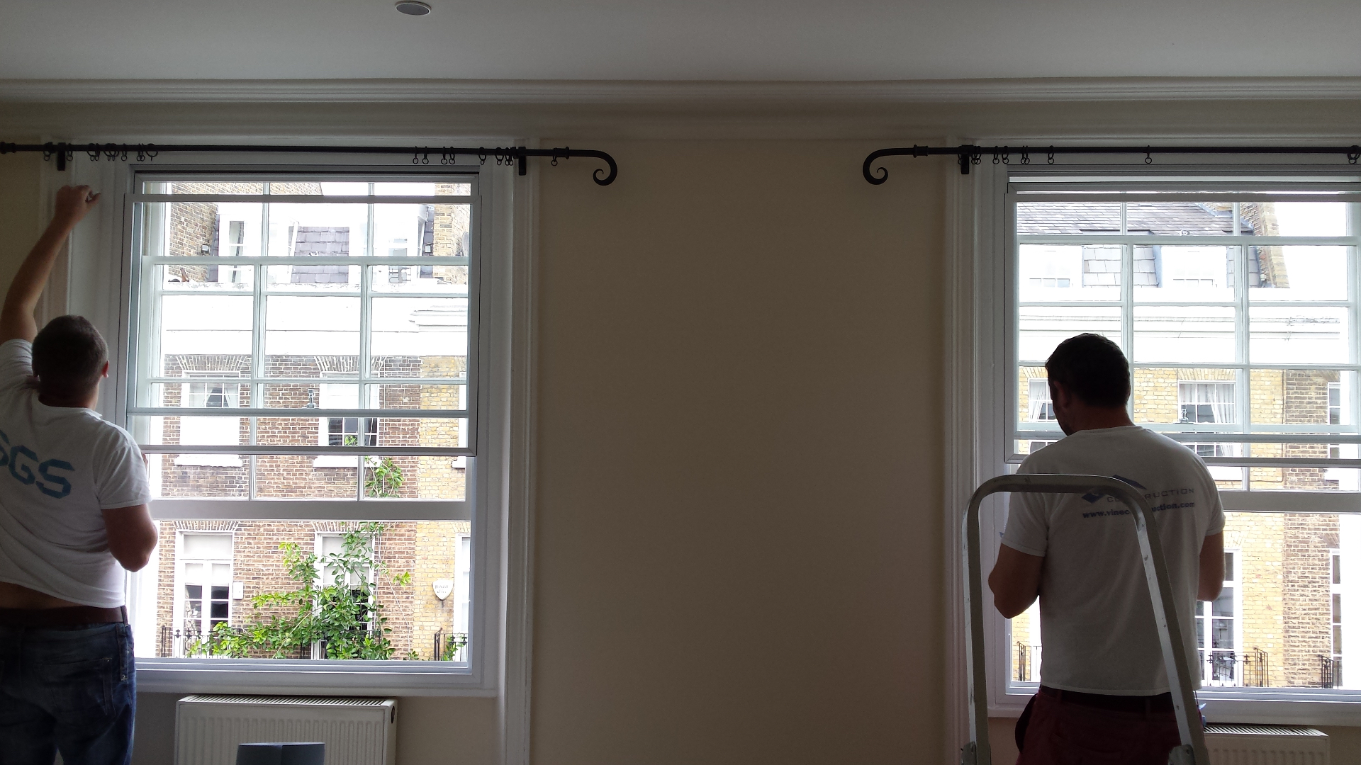 Secondary glazing installation in progress showing thermal insulation benefits